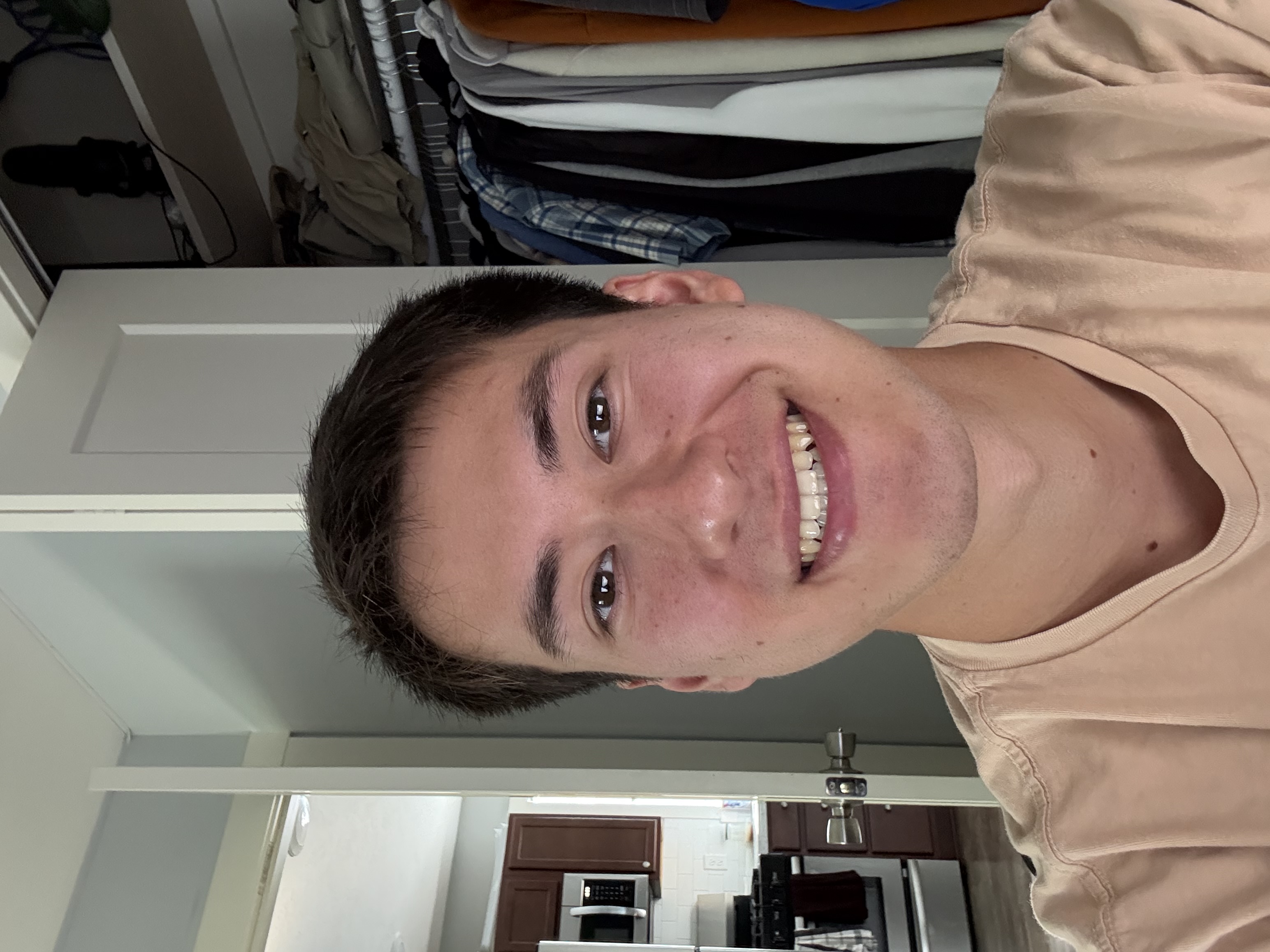 Brandon smiling at the camera.